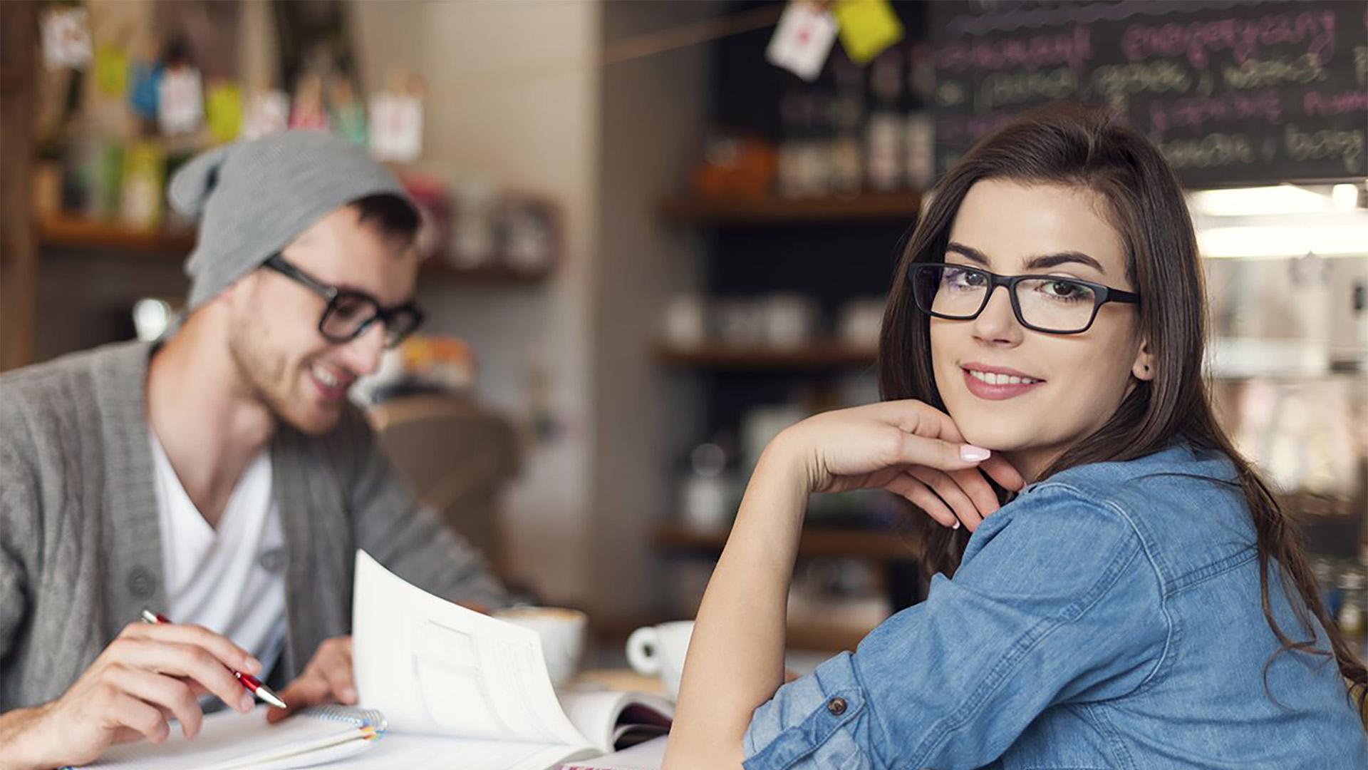 Two students in a coffee shop.