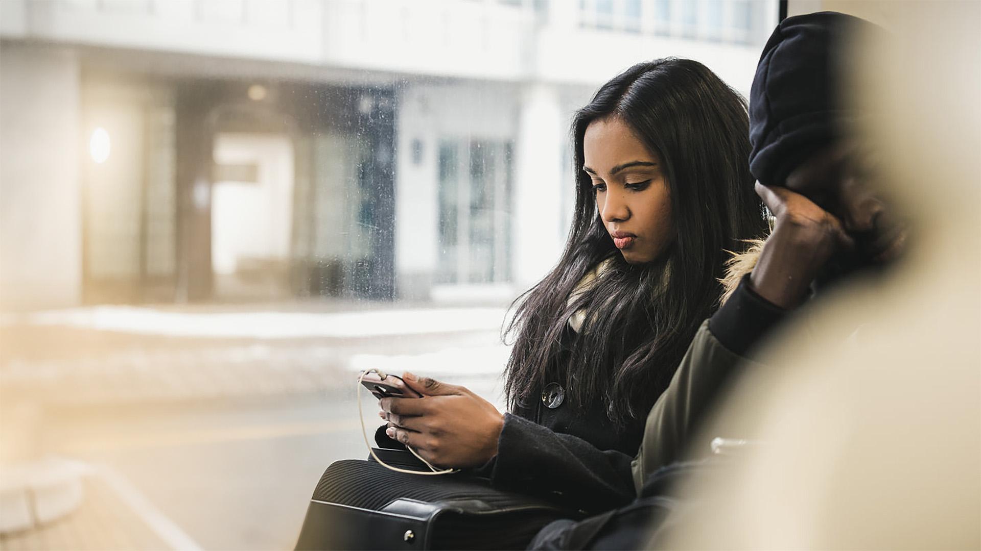 Woman on a bus.