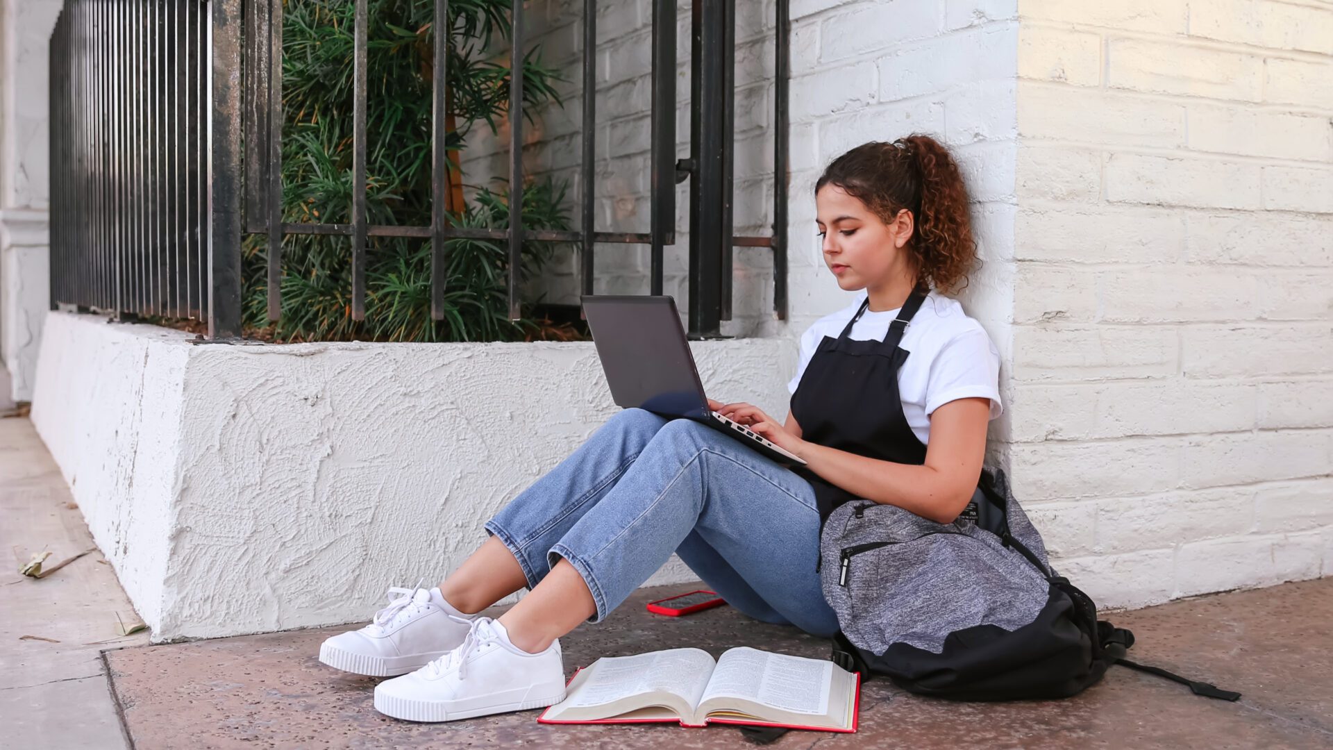 College student studying on a break from work