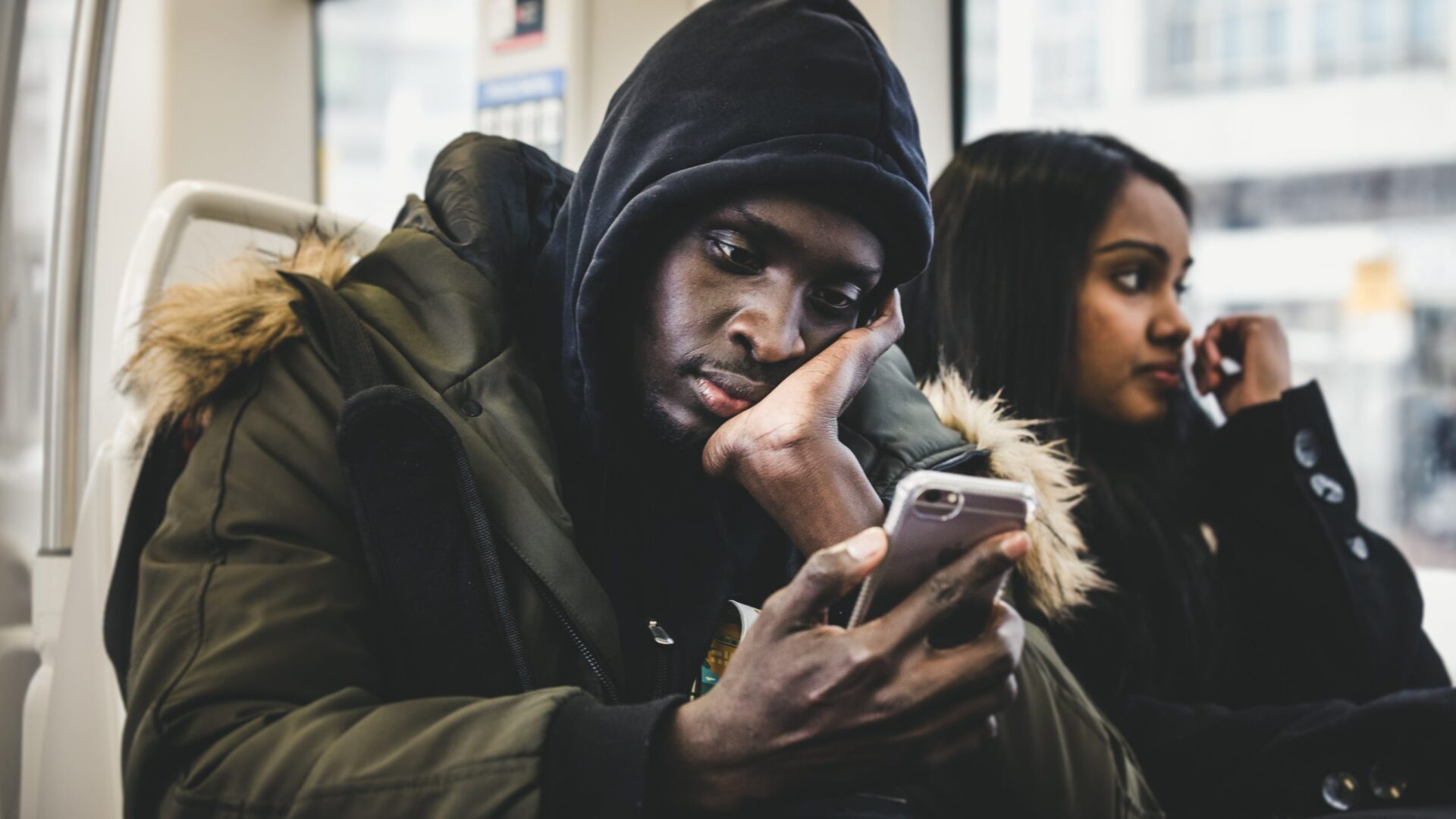 Tired student on public transit.