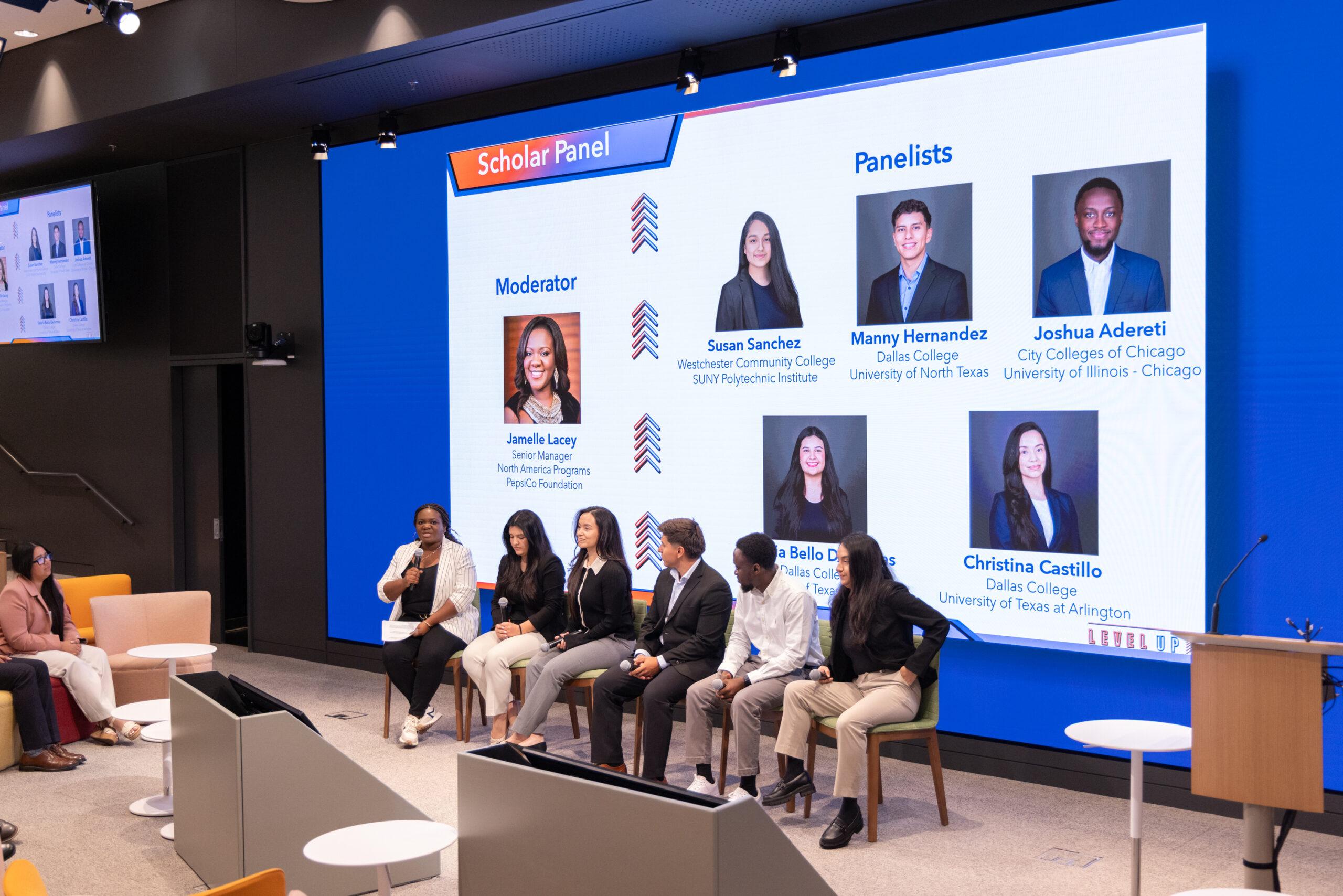 a moderated panel discussion with six students